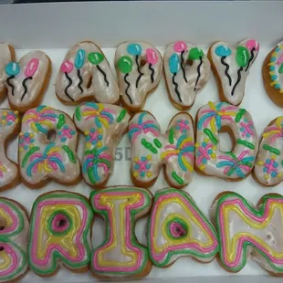 a box of decorated donuts