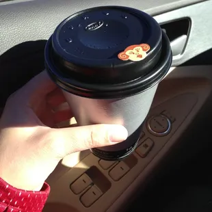 Coffee comes with a cute sticker to prevent driving disasters. Awesome!