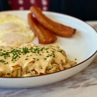The Farmer : cheesy hash browns, 2 eggs &amp; 2 bacon. Coffee was a caramel latte