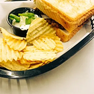 Sloppy Joe on toast with chips