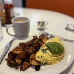 Veggie Omelet with crispy breakfast potatoes.