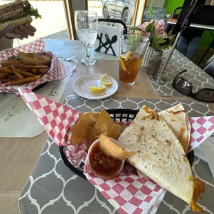 Chicken quesadillas and burger.