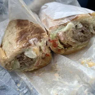 Cheesesteak sub with everything (lettuce, tomato, Mayo, fried onion and hot peppers.