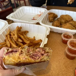 Reuben sandwich, fries and chicken wings