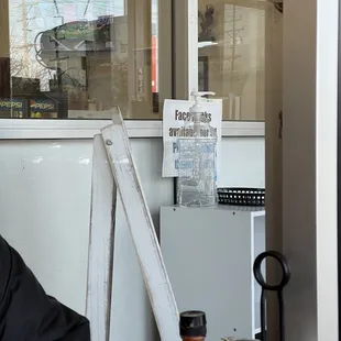 a man sitting outside a restaurant