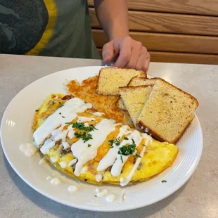 a plate of omelet and toast