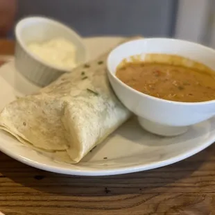 a burrito and a bowl of soup