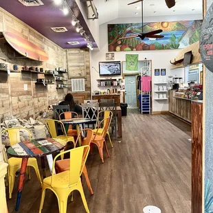 Inside of shop - charming beachy decor - sit + stay awhile. There&apos;s a small outside (shaded) coffee garden with seating out back