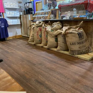 Bags of coffee beans ready for roasting