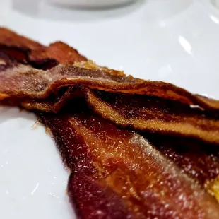 bacon on a white plate