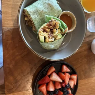 Breakfast burrito &amp; berries on the side.