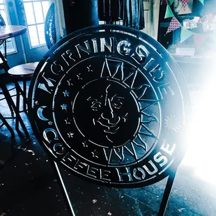 a clock on a stand