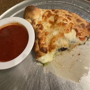 Calzone. Only 1/2. It's huge.
