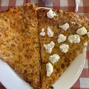 Plain and ricotta pizza slices