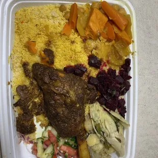Lamb and coucous, vegetable assortments