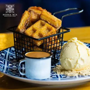 &quot;A&apos;Pa Churros&quot; Churros in the shape of a waffle, and yes, they come with delicious dulce de leche and ice cream.