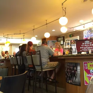 people sitting at the bar