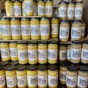 a display of jars of mustard