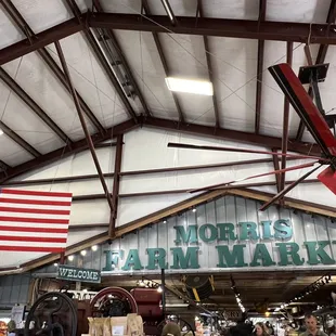 a red airplane hanging from the ceiling