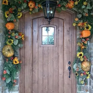 We can customize holiday arrangements for your entryway