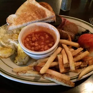 Irish Breakfast. 2 eggs, 2 bangers, rasher, toast, chips, 1 slice each of black and white pudding, stewed tomato and mushrooms.