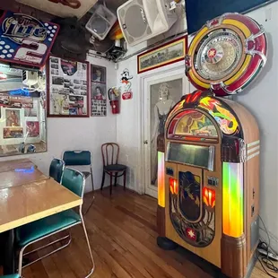a jukebox in the middle of the room
