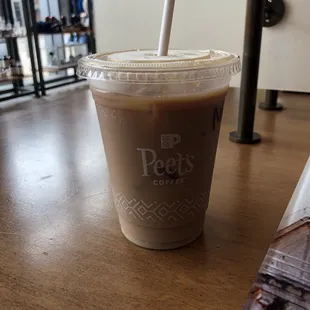 a cup of coffee on a table