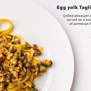 Egg yolk Tagliatelle, grilled pheasant sausage  on a bed of parmesan fondue