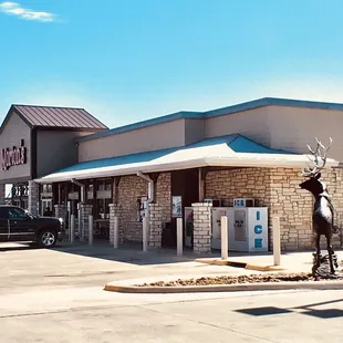 a car parked in front of a restaurant