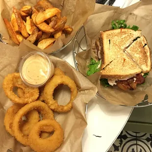 Top left: All in Club, Western fries, side of onion rings.