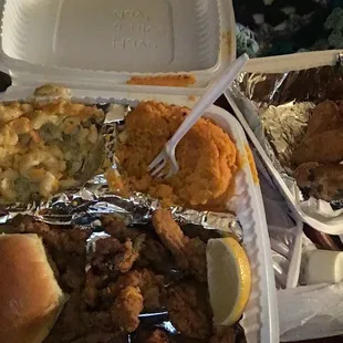 Fried oyster sides Mac/cheese, sweet potatoes are really good , although the fried oyster batter is a bit salty but good enough to eat