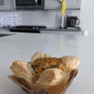 Bacon artichoke quiche on puff pastry