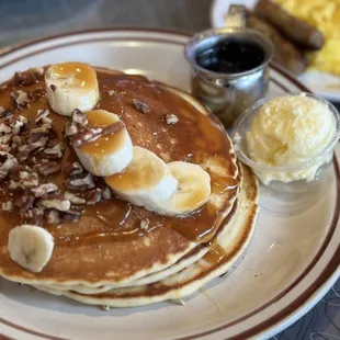 *Banana Nut Pancakes with added eggs + sausage ($ extra).