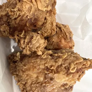 three pieces of fried chicken
