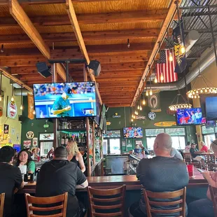 people sitting at the bar