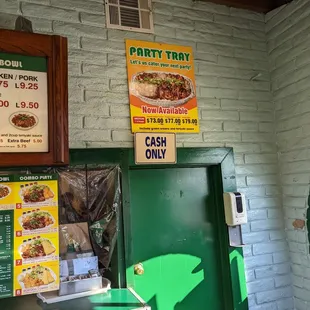a man standing in front of a restaurant