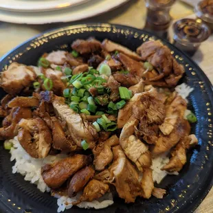 a plate of chicken and rice