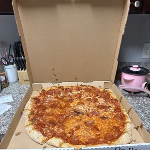 Supposed to be a large pepperoni, and bacon pizza. Yes bacon costs extra and you can&apos;t even see it..