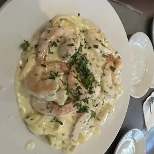  a plate of shrimp pasta