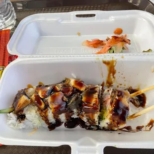 a meal in a styrofoam container