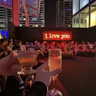 two people toasting champagne glasses