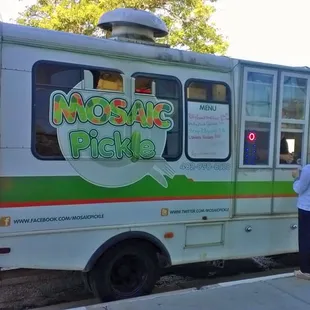 a woman getting on a bus