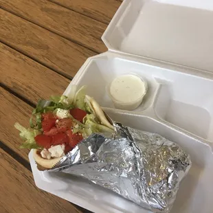 a sandwich in a styrofoam container