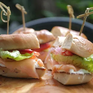 two sandwiches on a cutting board