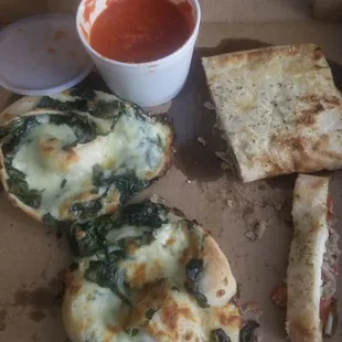 2 spinach rolls and a stromboli
