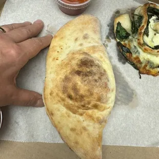 Calzone with some cheese and ricotta only in the center