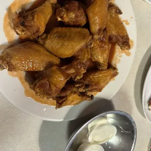 Wings are really good!  I think they are precooked before frying. Delicious