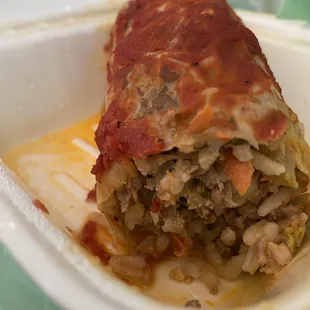 Cabbage roll has rice, meat and veggie. $6.99 for this. $9.99 per lb