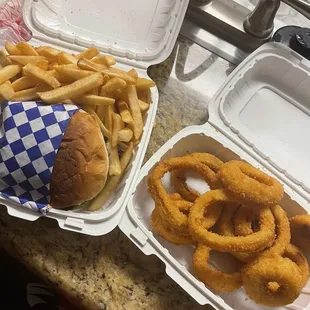 Cheeseburger with fries and a side Onion Rings