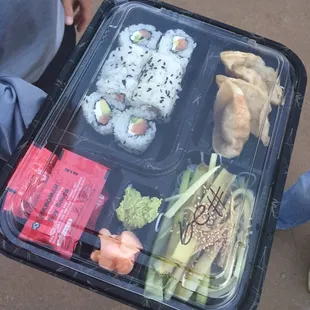 $10 bento box (philly roll, gyoza, cucumber salad)